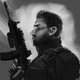Frank Grillo with a big old gun